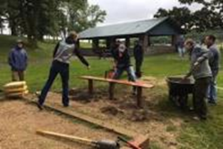 Dudes installing Pete's memorial bench